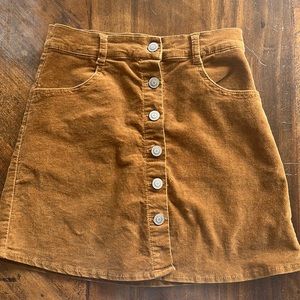 Like new Brandy Melville brownish gold colored soft button up skirt
